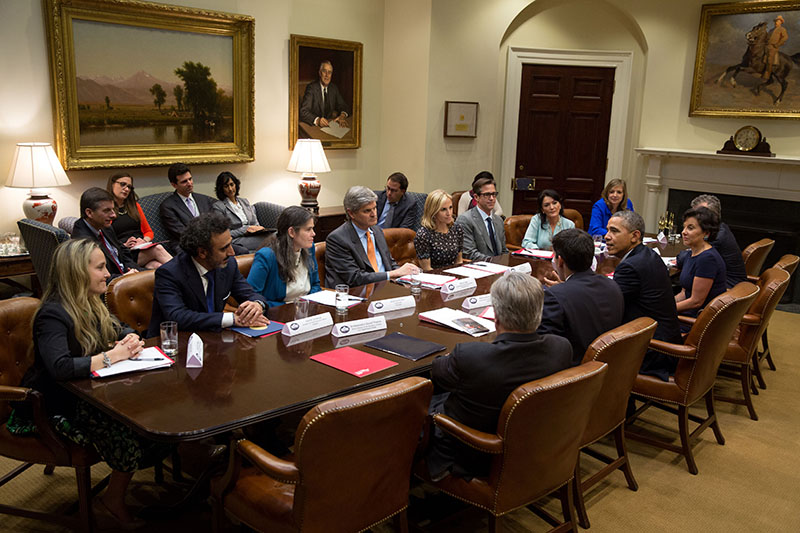 President Barack Obama drops by the first meeting of the Presidential Ambassadors for Global Entrepreneurship, with Commerce Secretary Penny Pritzker, in the Roosevelt Room of the White House, April 7, 2014. (Official White House Photo by Pete Souza)